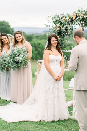 Marriage ceremony in progress at a wedding reception venue in Vermont